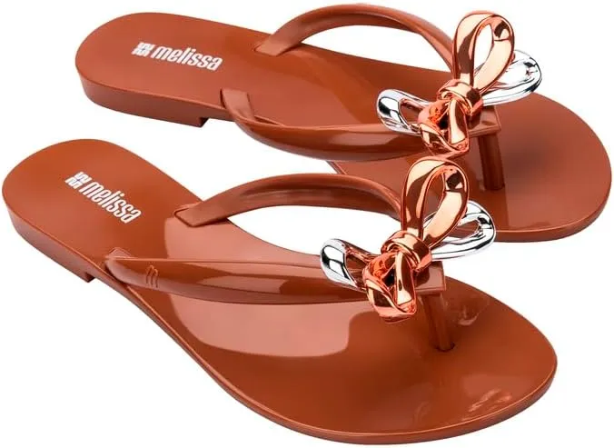 Melissa Harmonic Eclipse Womens Fashion Sandals - Dressy Flip Flops with Metallic Bow - Lightweight PVC, Flexible Design - Summer Sandals for Women, Flat & Flexible