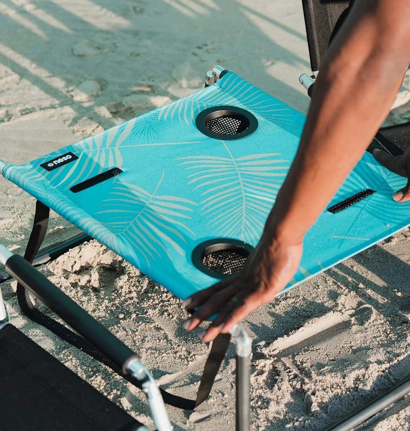 Neso Portable Beach Table with Cup Holders, Cell Phone Pockets, Lightweight for Picnics and Parks (Aqua Fronds)